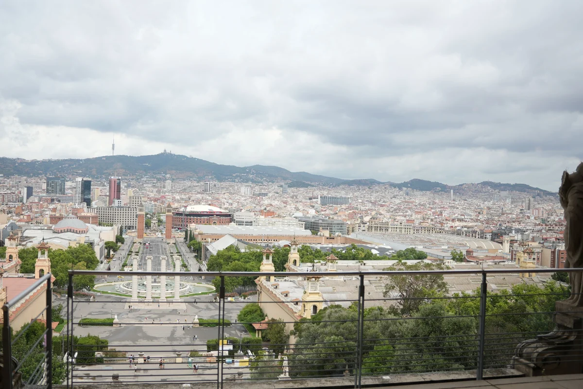 Barcelona city views from MNAC Montjuïc terrace, with Plaça d'Espanya and the city skyline in the background