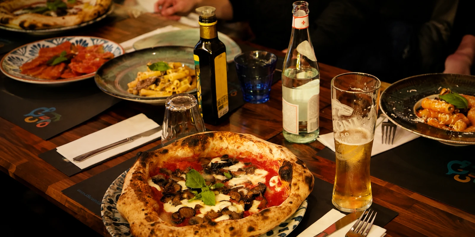 Neapolitan pizza fresh from the oven on the counter of a pizzeria in Barcelona's Gothic Quarter